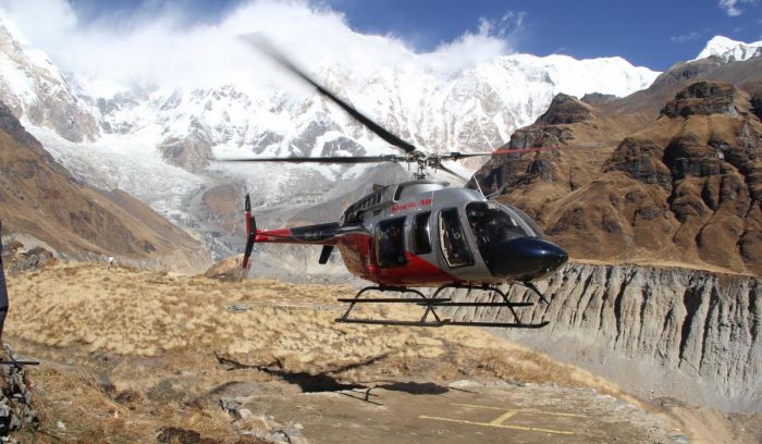 Helicopter landing at Annapurna base camp 4130m